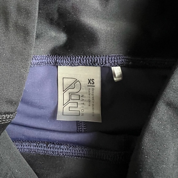 P.E. Nation navy blue workout leggings with thick black waistband - Picture 4 of 6